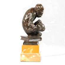 Load image into Gallery viewer, Bronze spectacled monkey considering a human skull, England, c.1900