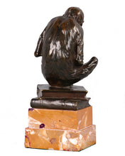 Load image into Gallery viewer, Bronze spectacled monkey considering a human skull, England, c.1900