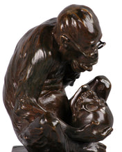 Load image into Gallery viewer, Bronze spectacled monkey considering a human skull, England, c.1900