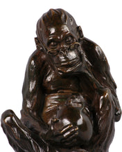 Load image into Gallery viewer, Bronze spectacled monkey considering a human skull, England, c.1900