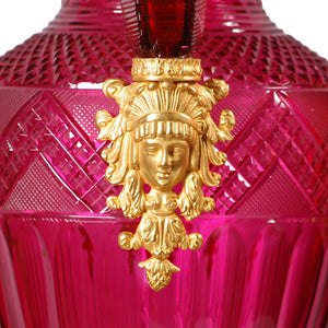 A fine pair of large ormolu-mounted cranberry colored cut glass vases in the Russian Empire style