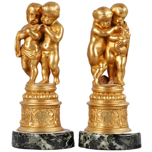 Pair of ormolu putti groups, France, c.1875