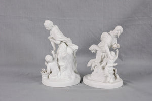 Pair of white porcelain figural groups, France, c.1860