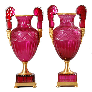 Ormolu mounted cranberry cut glass urns