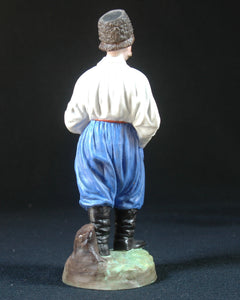 Gardner biscuit porcelain figure of Cossack with a pipe, Russia, c.1890