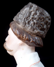 Load image into Gallery viewer, Gardner biscuit porcelain figure of Cossack with a pipe, Russia, c.1890